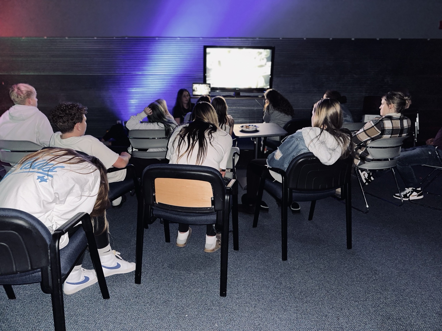 Students gathered in a small group discussion