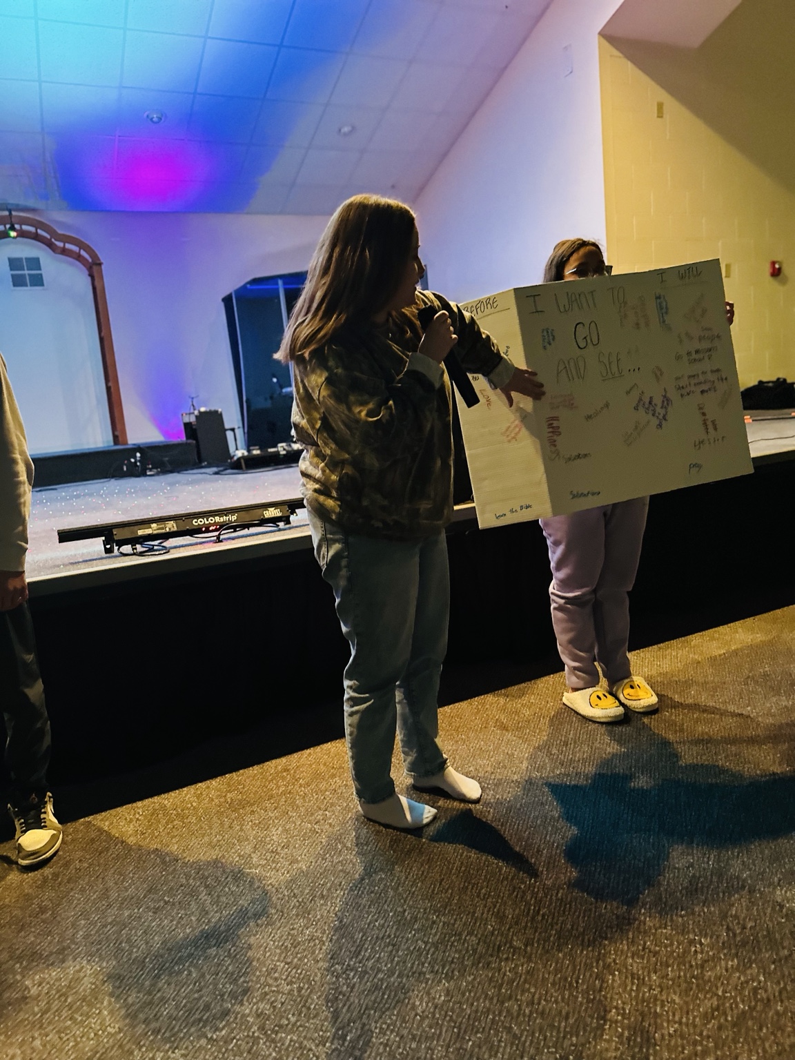 Student sharing a vision board during the experience